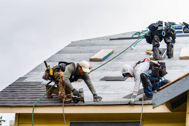 Professional Gutter Installation technician working in Mill Neck, NY